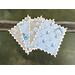 Blue faux stamps with Easter and spring patterns.